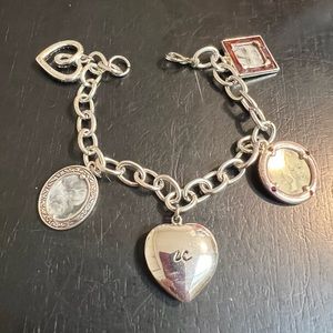 ONE PRE-OWNED 7-1/2” SILVERTONE CHARM BRACELET CTM1